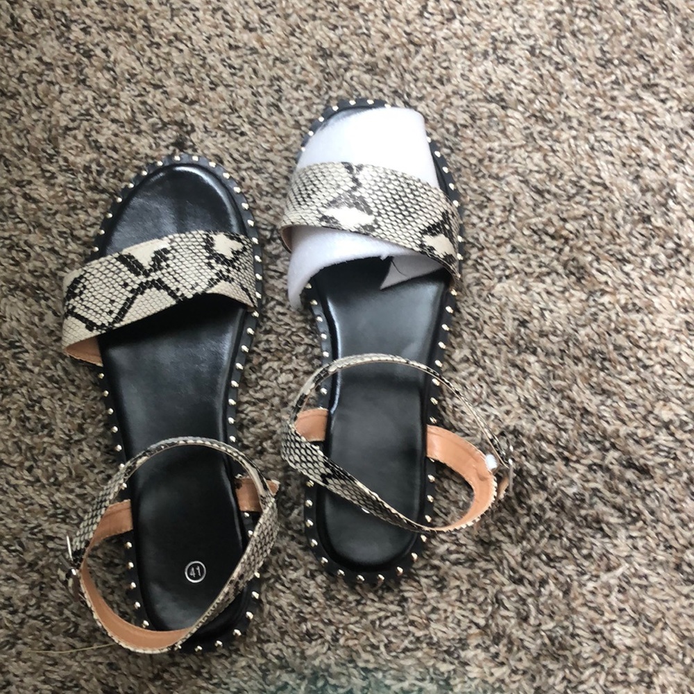 Snake skin sandal runs like a true 10